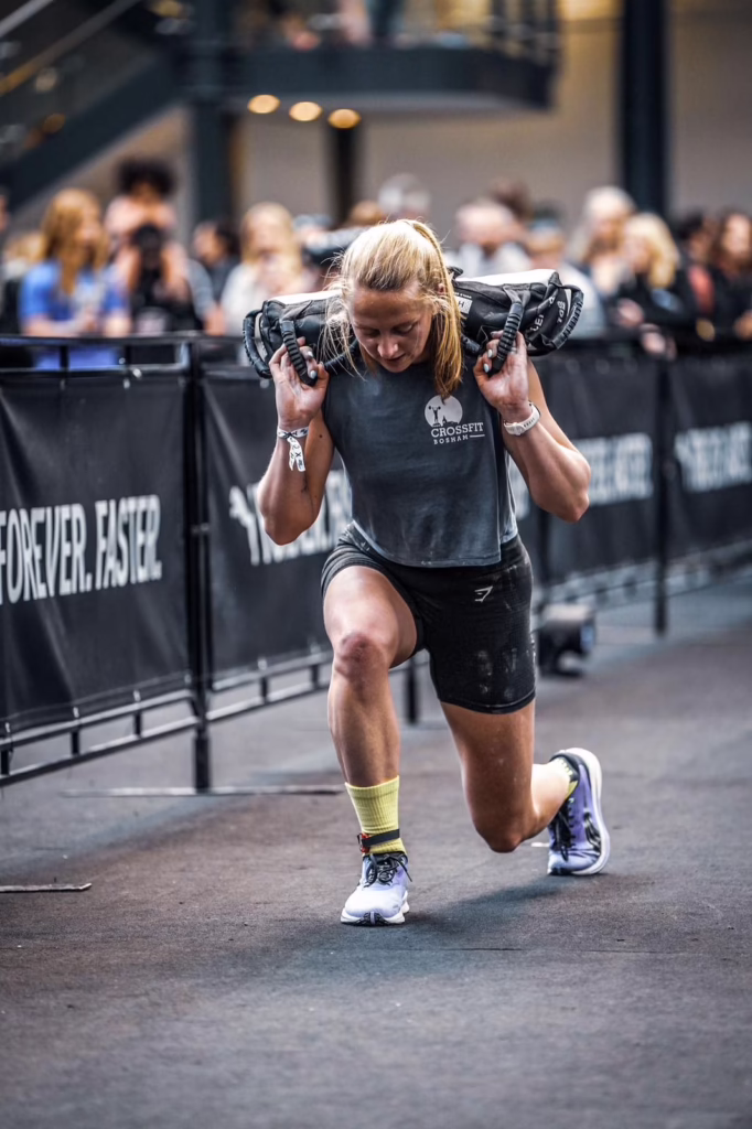 Athlete performing weighted lunges